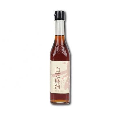 Aceite de semilla de sésamo negro puro, prensado en frío y mezclado. Una adición sabrosa a su cocina.