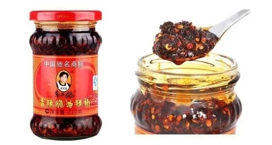 Salsa de chile Laoganma mezclada con aceite rojo de chile con sabor a pollo fermentado y soja