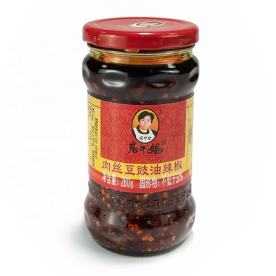 Salsa de chile Laoganma mezclada con aceite rojo de chile con sabor a pollo fermentado y soja
